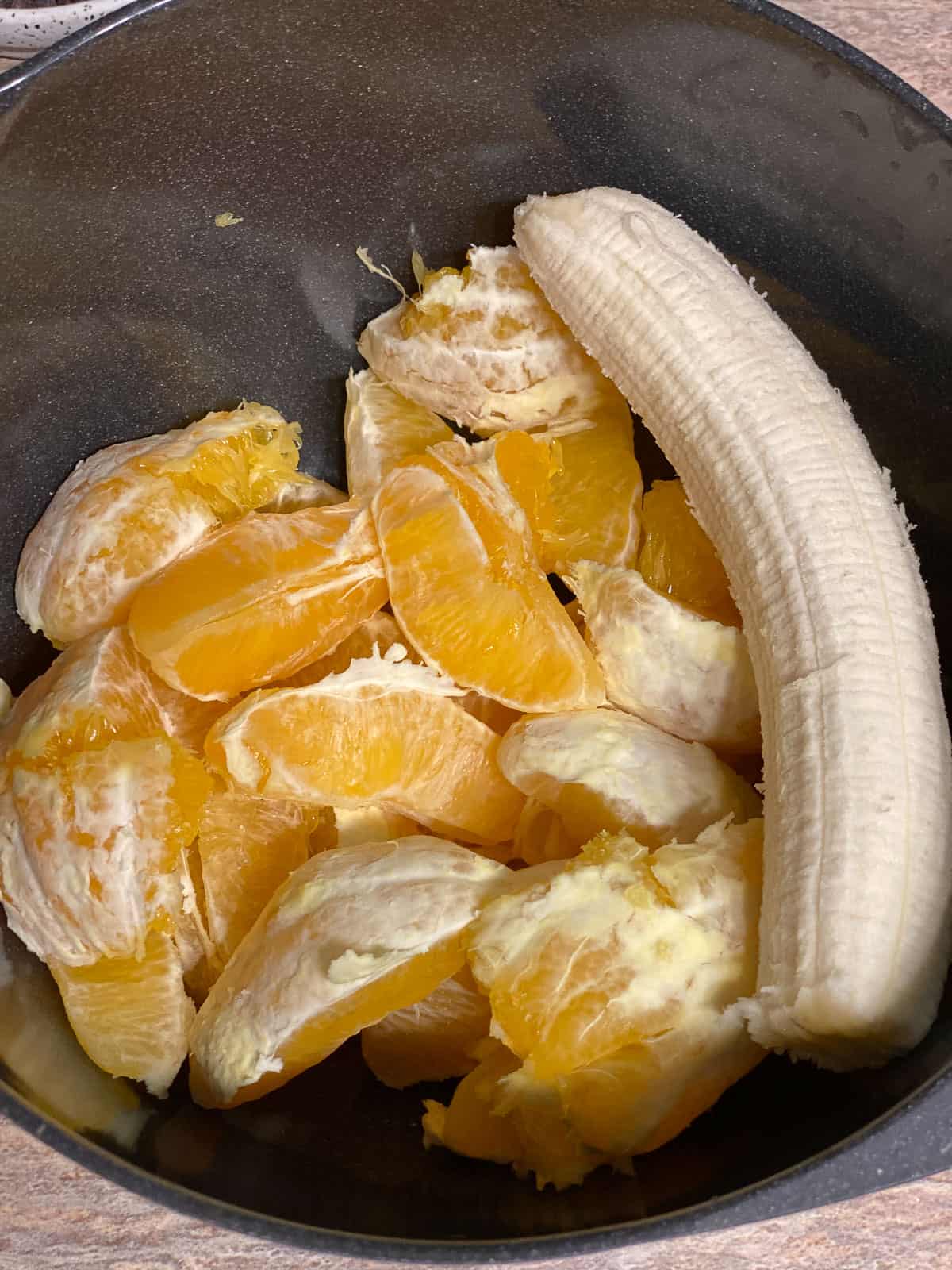 oranges and banana in a blender