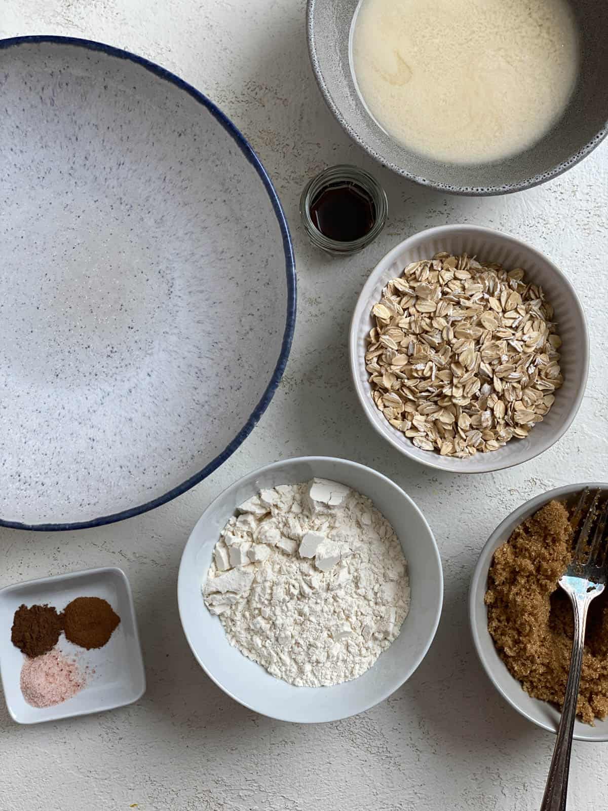 ingredients for Easy Pear Crisp [Vegan Pear Crumble] against a white surface