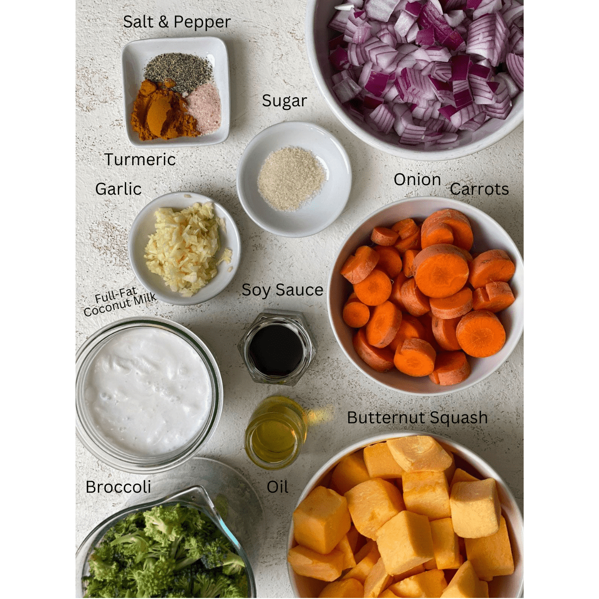 ingredients for Butternut Squash Sauce and Roasted Veggies measured out against a light surface