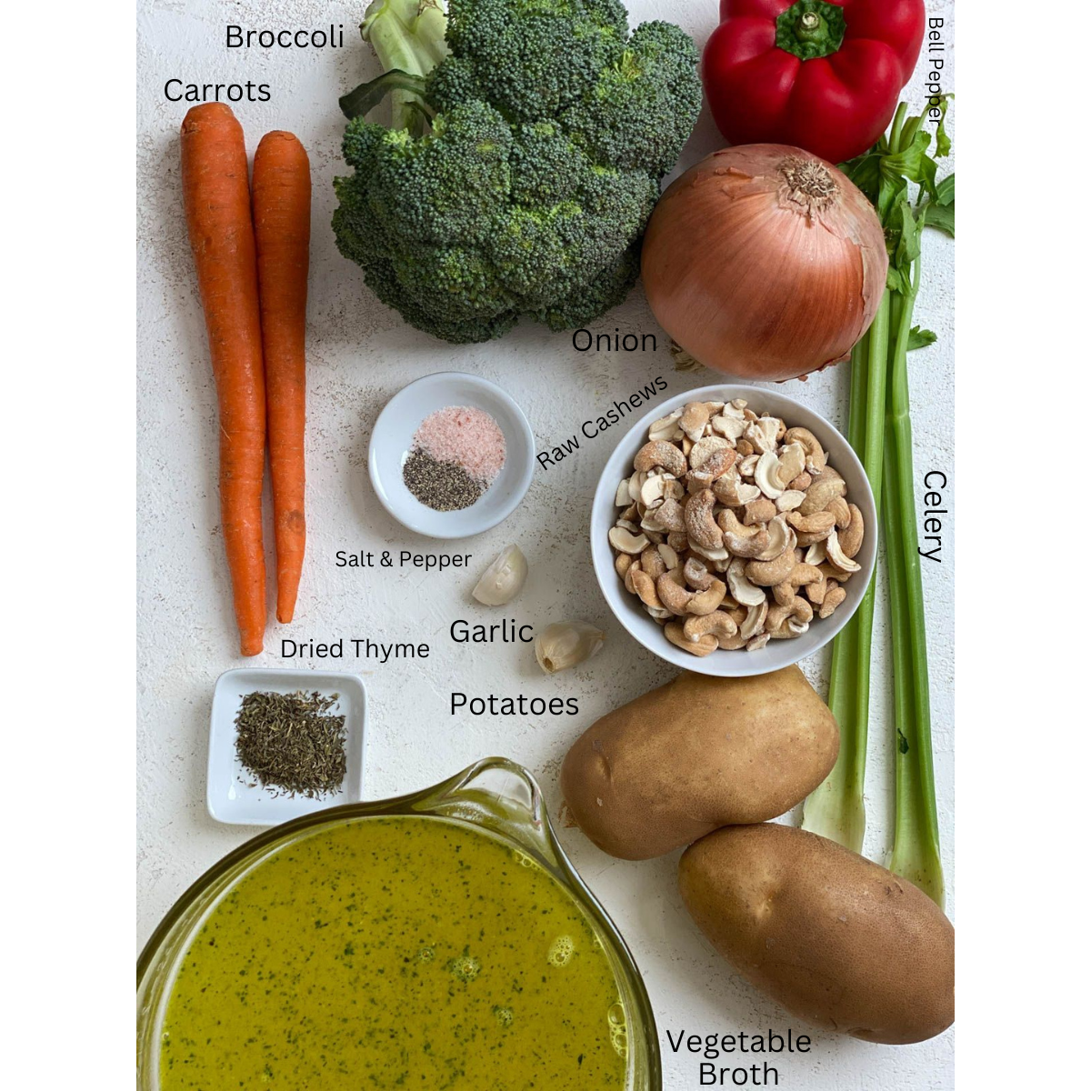 ingredients for Cream of Broccoli Soup measured out against a white surface