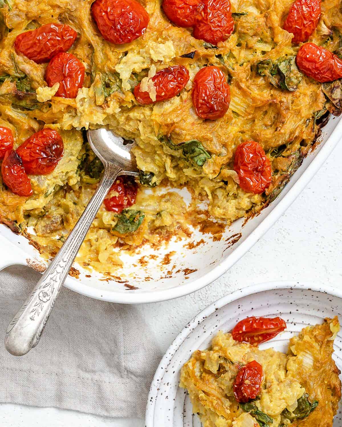 completed Vegan Potato Frittata [Breakfast Casserole] in a baking tray against a light background