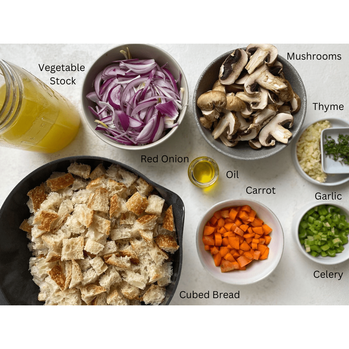 mushroom stuffing ingredients measured out against a white surface