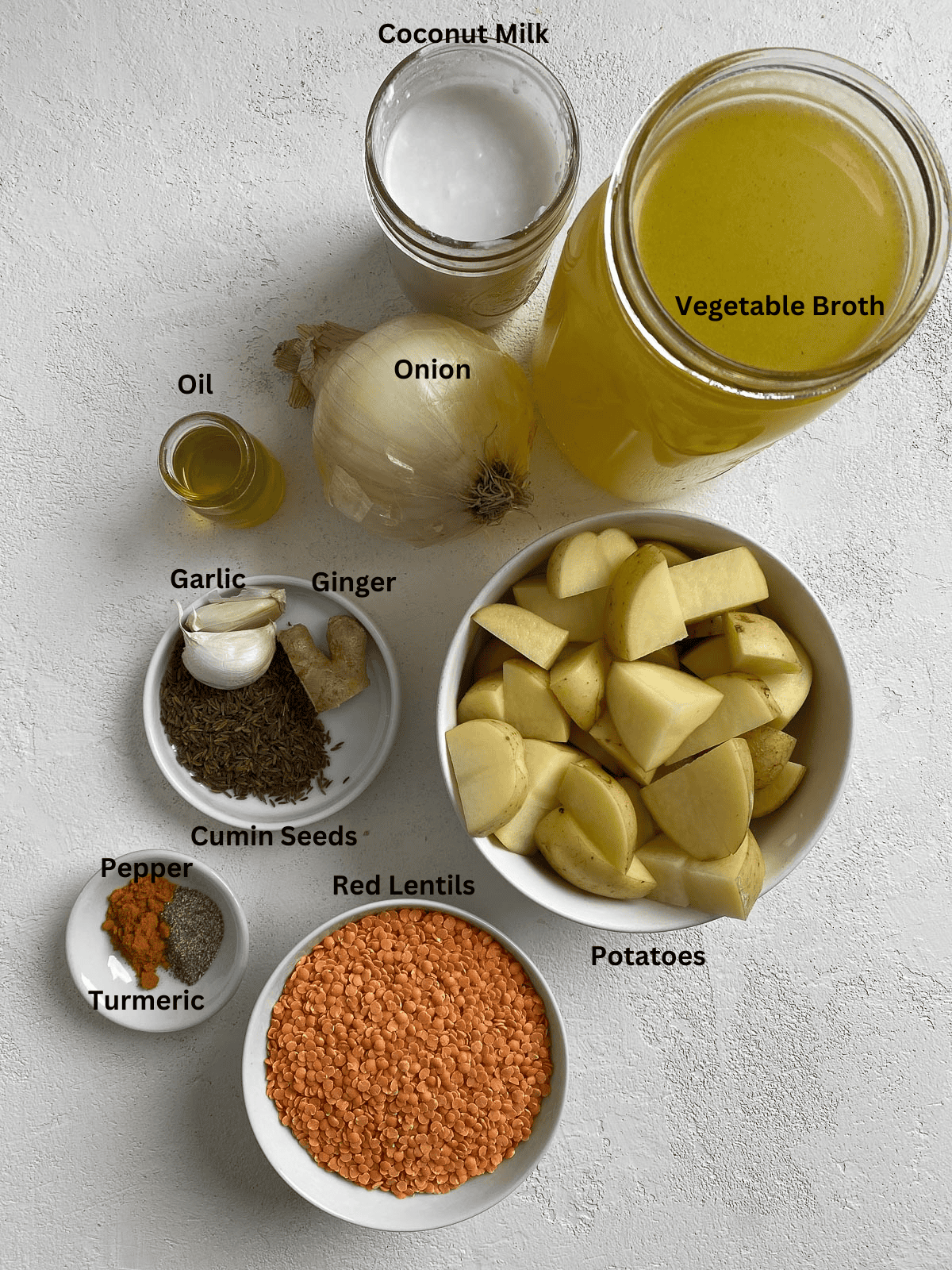 ingredients for Lentil Potato Soup measured out against a white surface