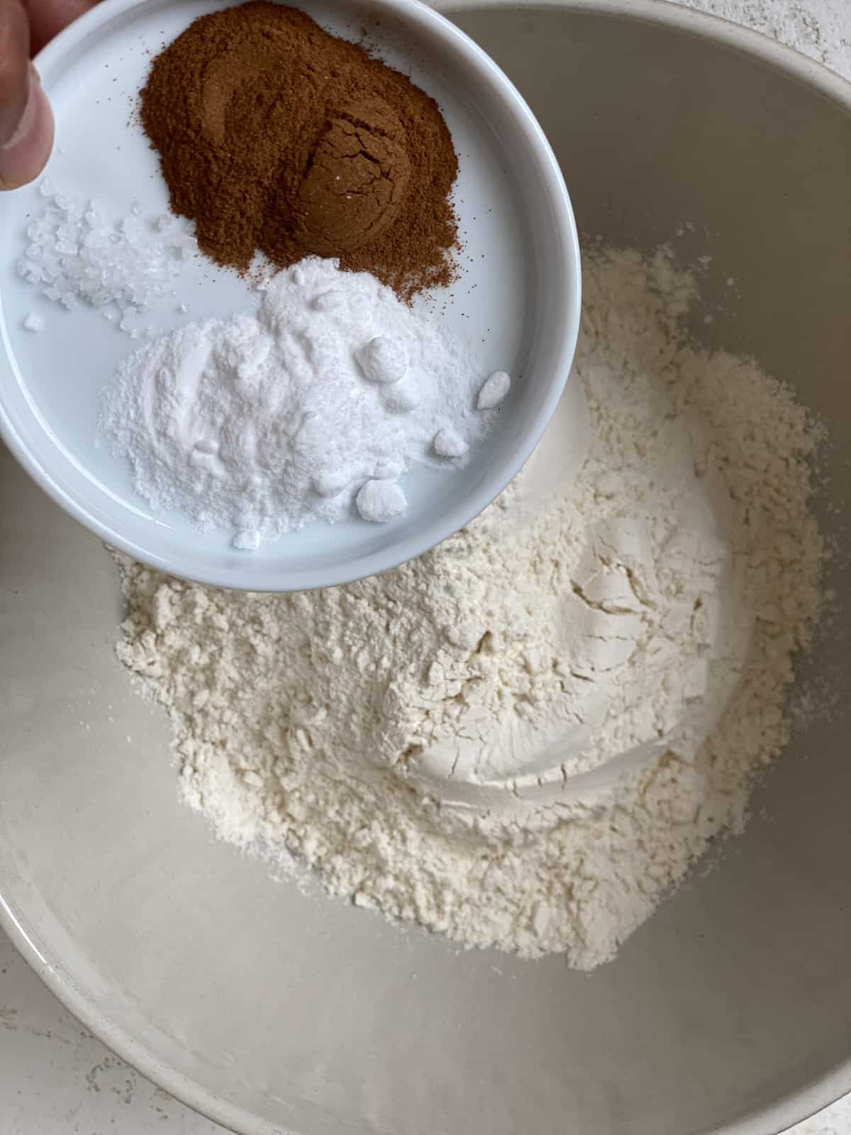 process shot of mixing dry ingredients in a bowl