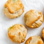 completed Mini Vegan Pot Pies scattered on a white surface