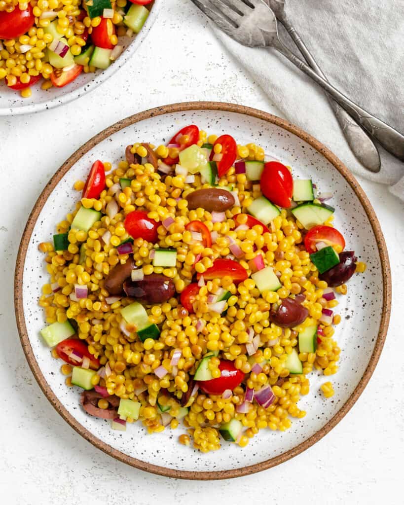 Mediterranean Pearl Couscous Salad PlantBased on a Budget