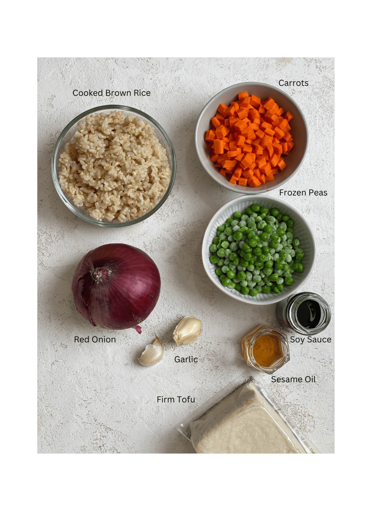 ingredients for Easy Vegetable Brown Fried Rice measured out against a light surface