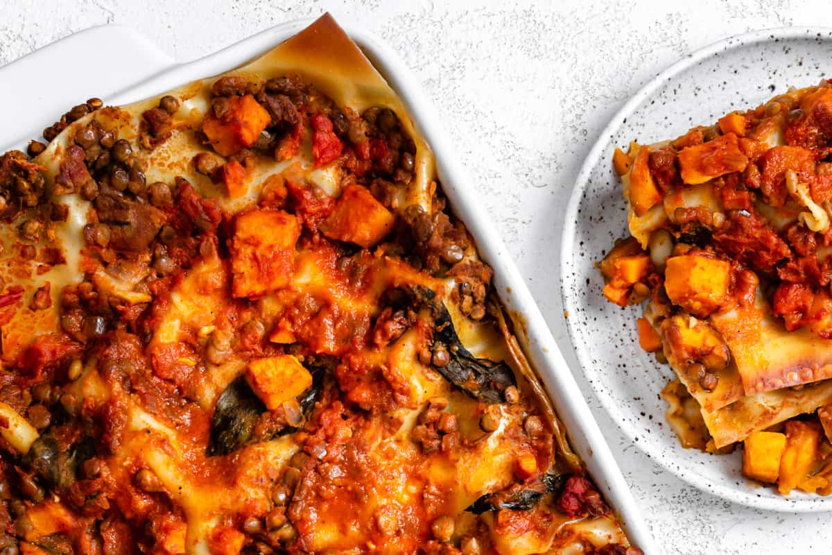 completed Easy Sweet Potato Lasagna in a baking dish against a white surface