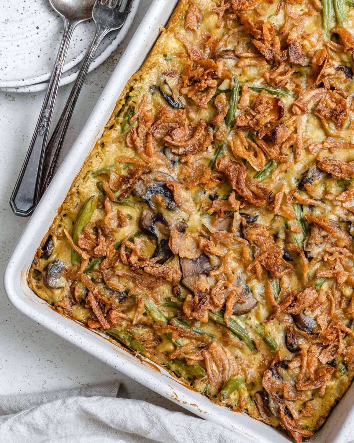 completed Dairy-Free Green Bean Casserole in a white baking dish