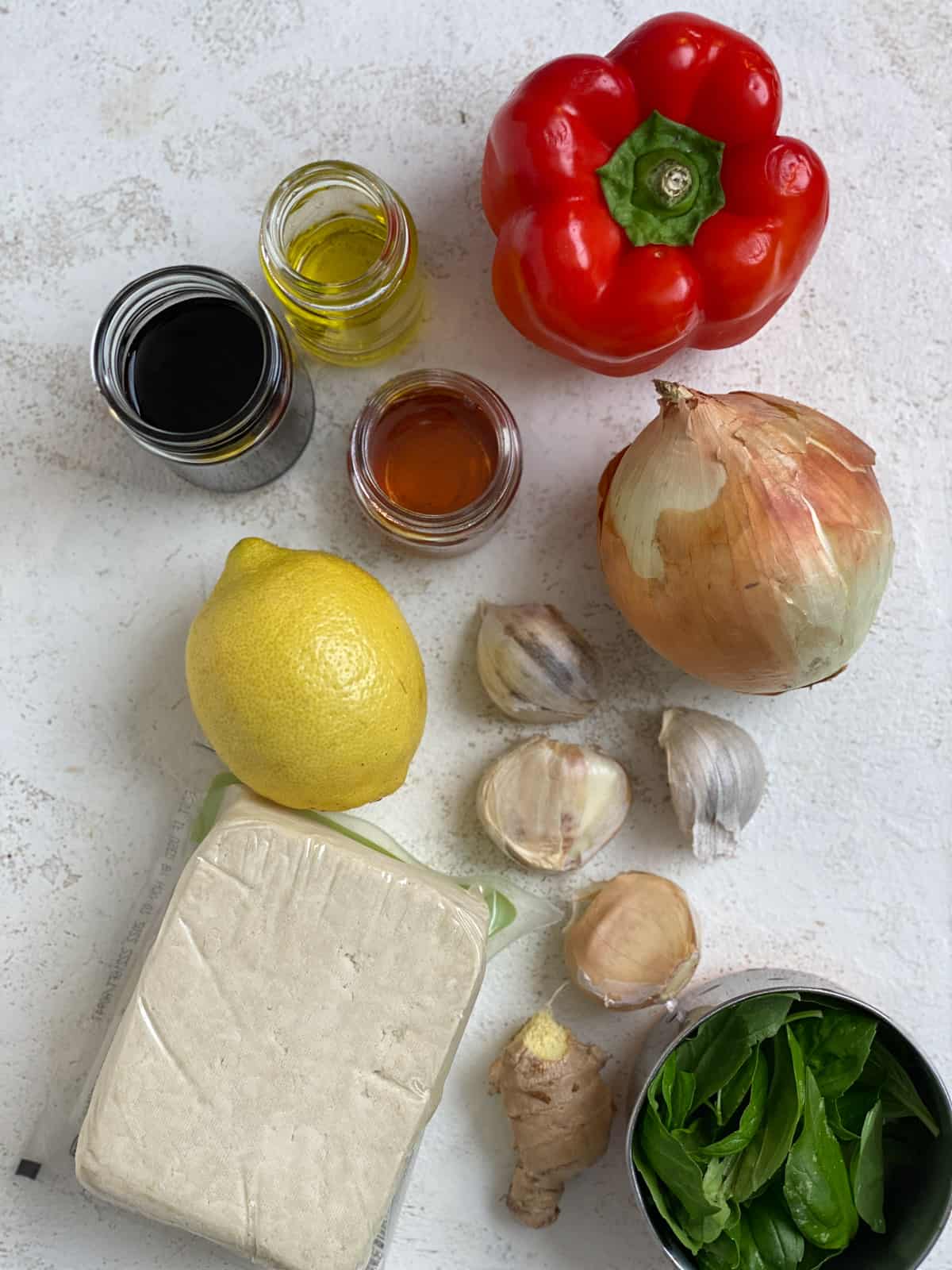 ingredients for Lemon Basil Tofu on a white surface