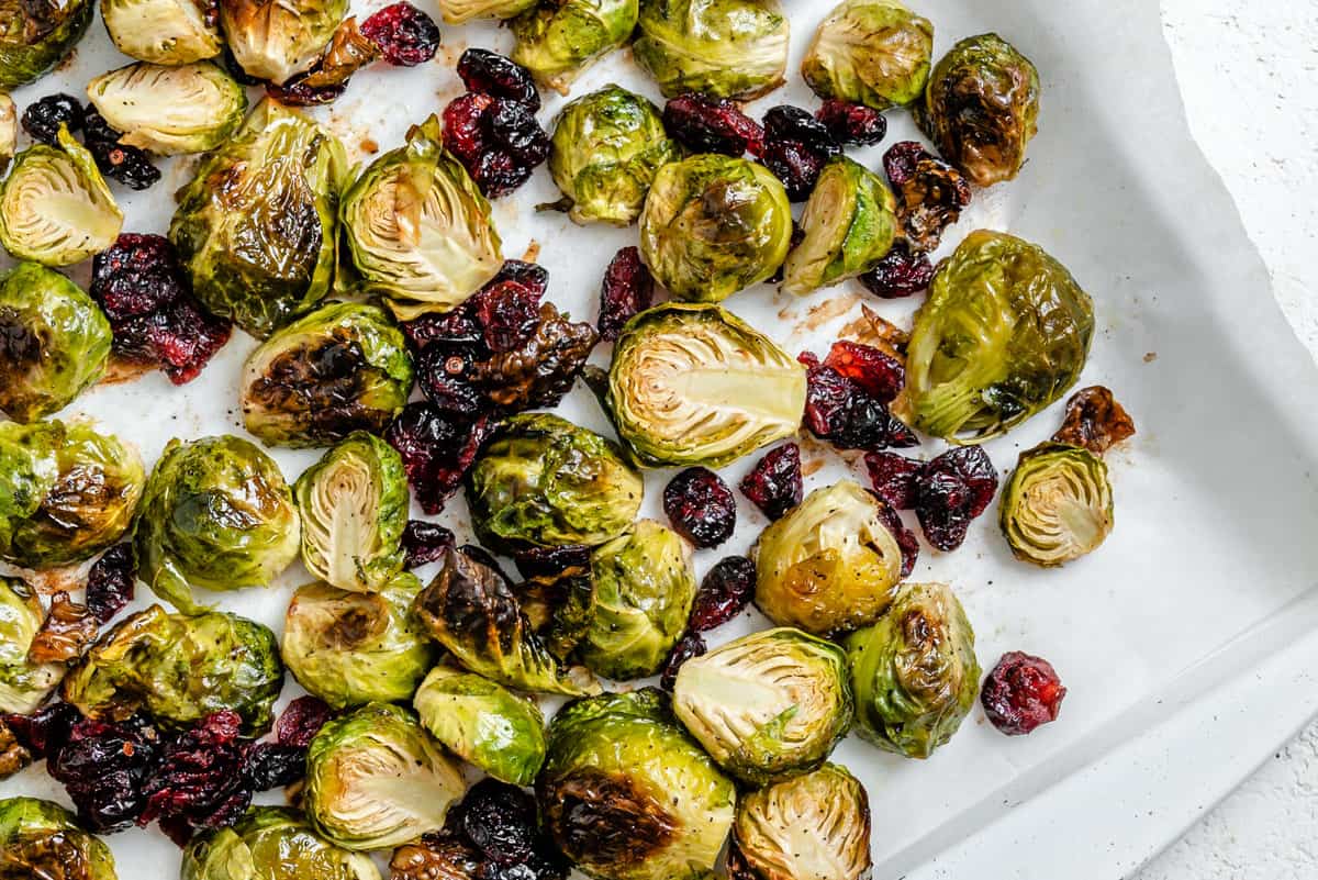 completed Roasted Brussels Sprouts with Cranberries on a white dish