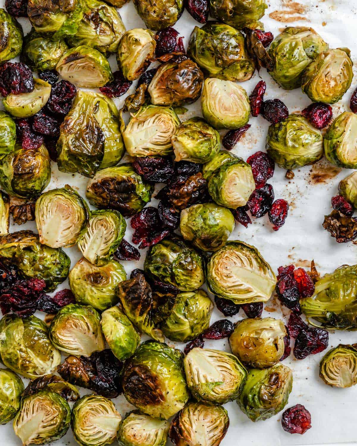 completed Roasted Brussels Sprouts with Cranberries on a white dish