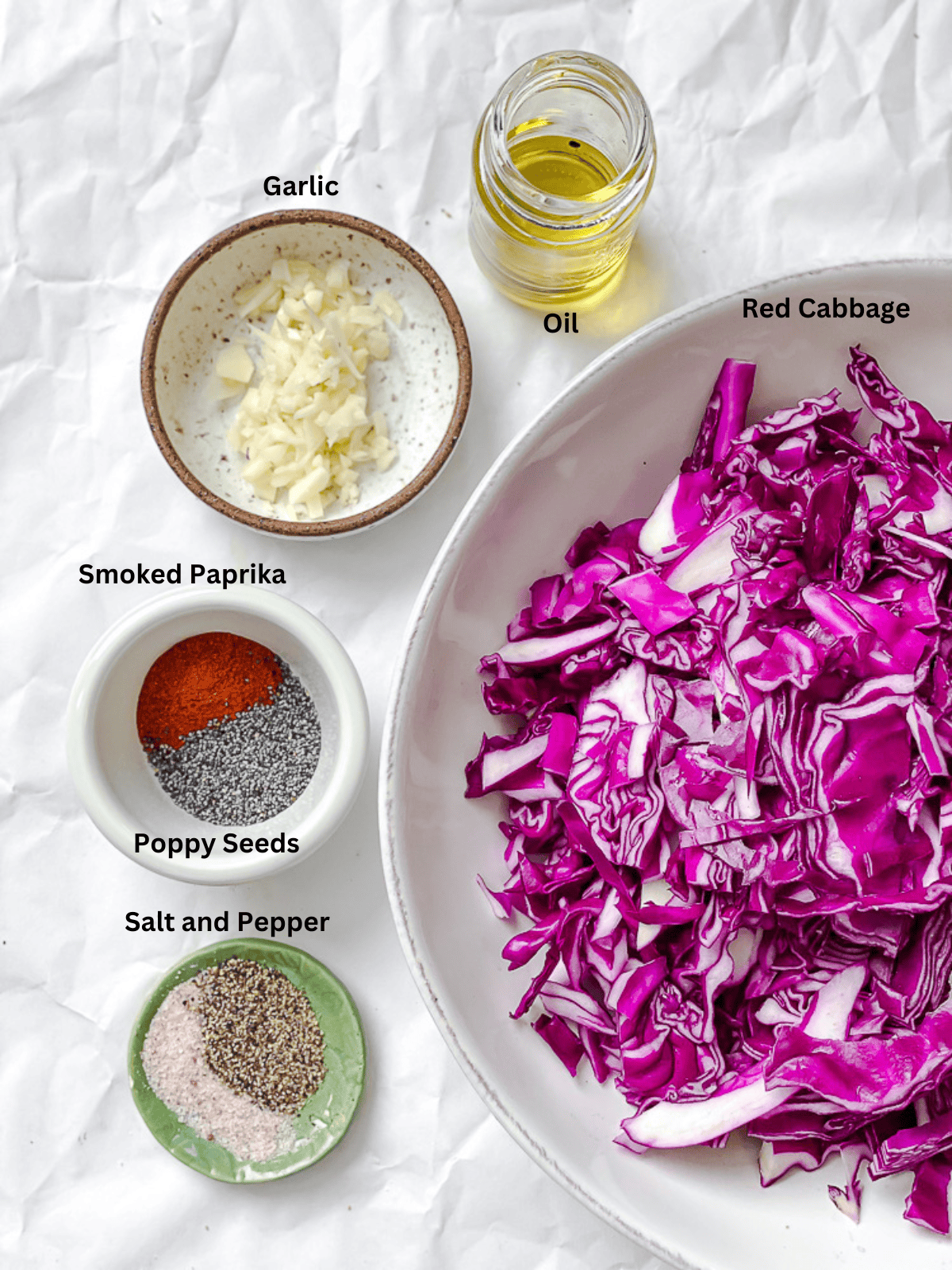 ingredients for Sautéed Red Cabbage [4 Ways] measured on a white surface