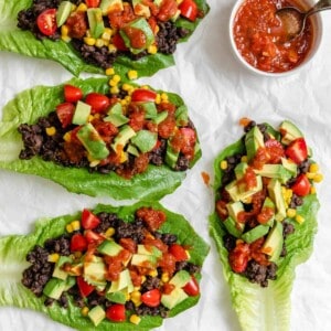 completed Vegan Black Bean Lettuce Wraps against a white surface