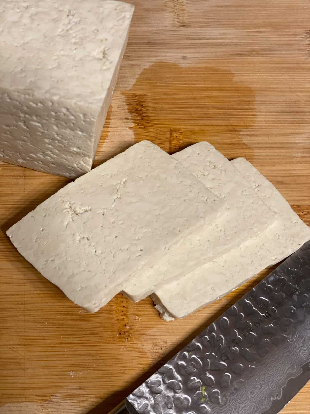 slices of tofu on a cutting board