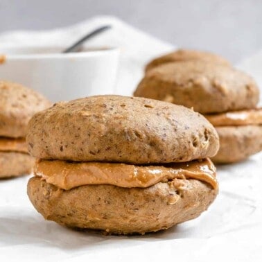 completed Vegan Peanut Butter Cookies [With Filling| Sandwich Cookies] on a white surface
