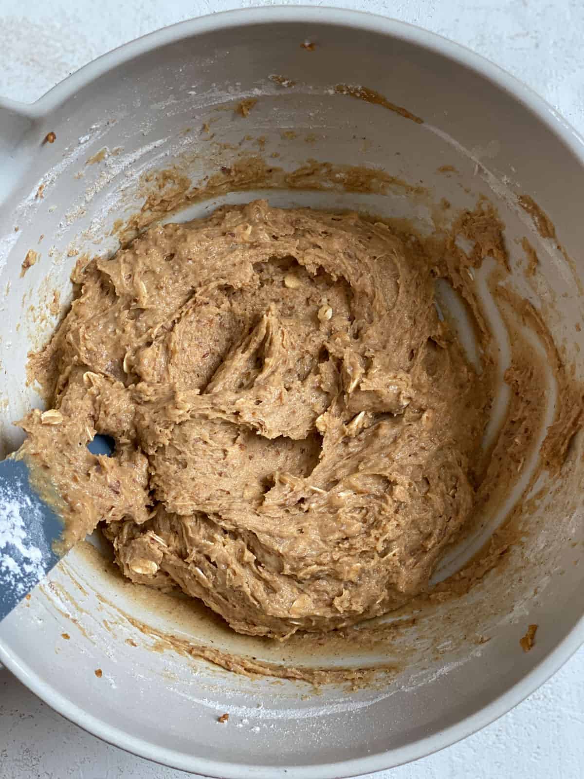 process shot of mixing peanut butter mixture in bowl