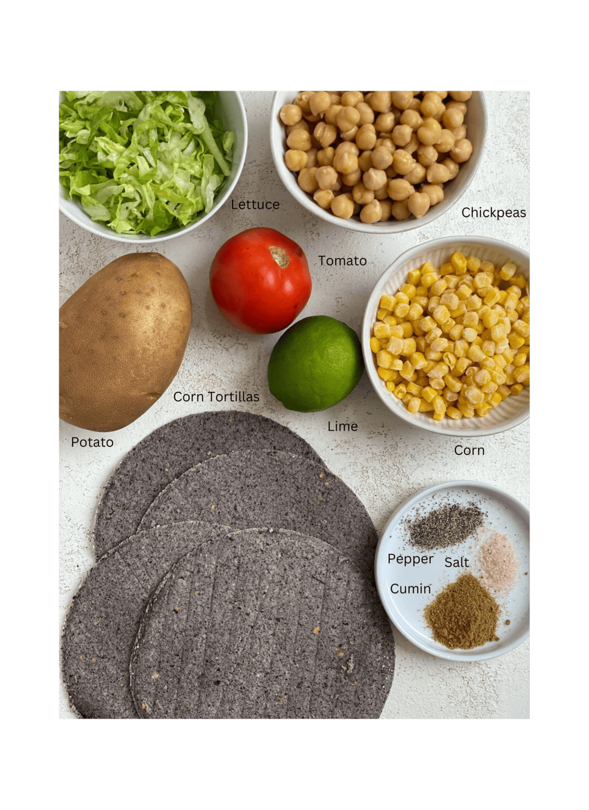 ingredients for Potato and Chickpea Tacos measured out against a light surface