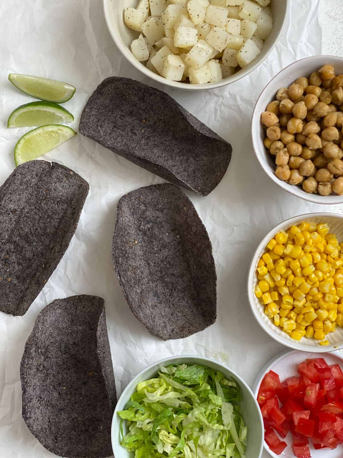 ingredients for Potato and Chickpea Tacos measured out against a light surface