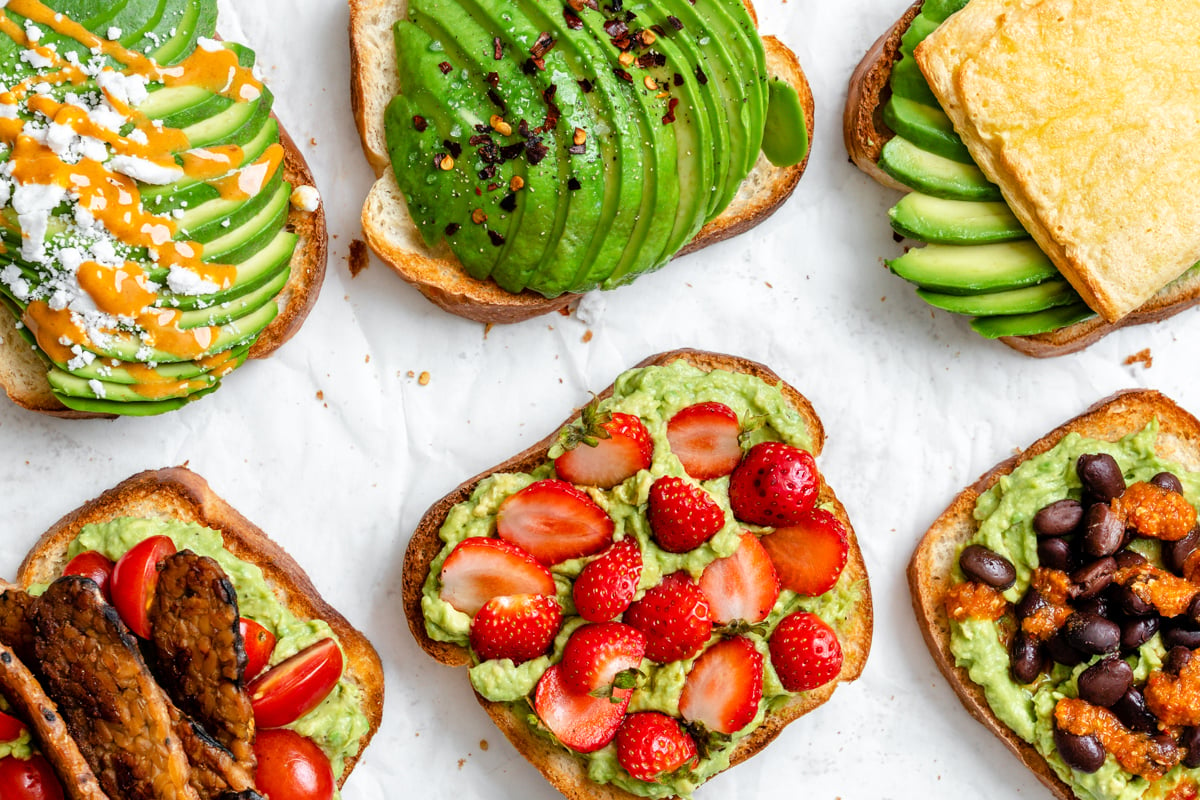 completed pieces of Vegan Avocado Toast spread out on a white surface