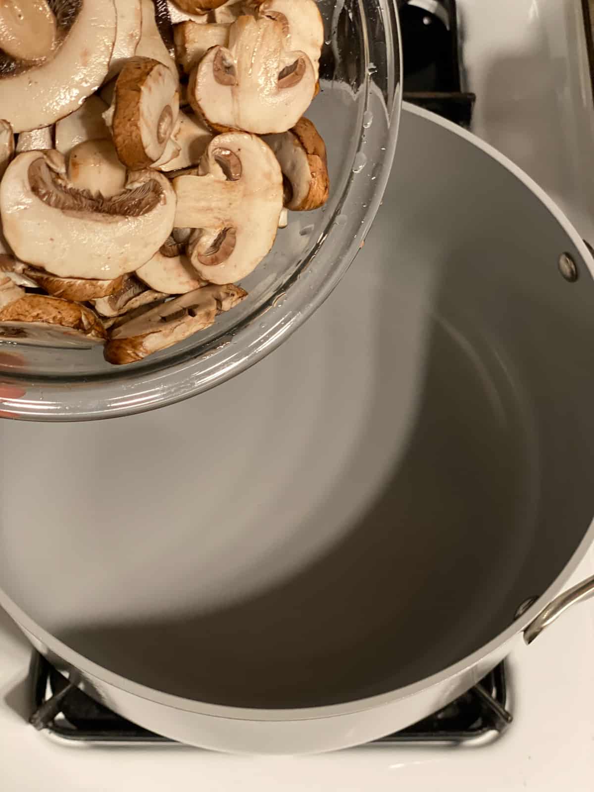 process s،t of adding mushrooms to pan
