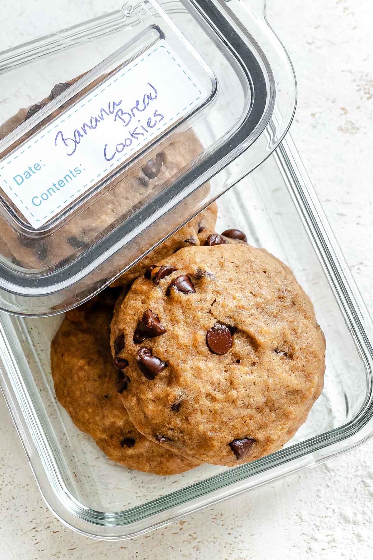 Completed Banana Bread cookies in storage container.