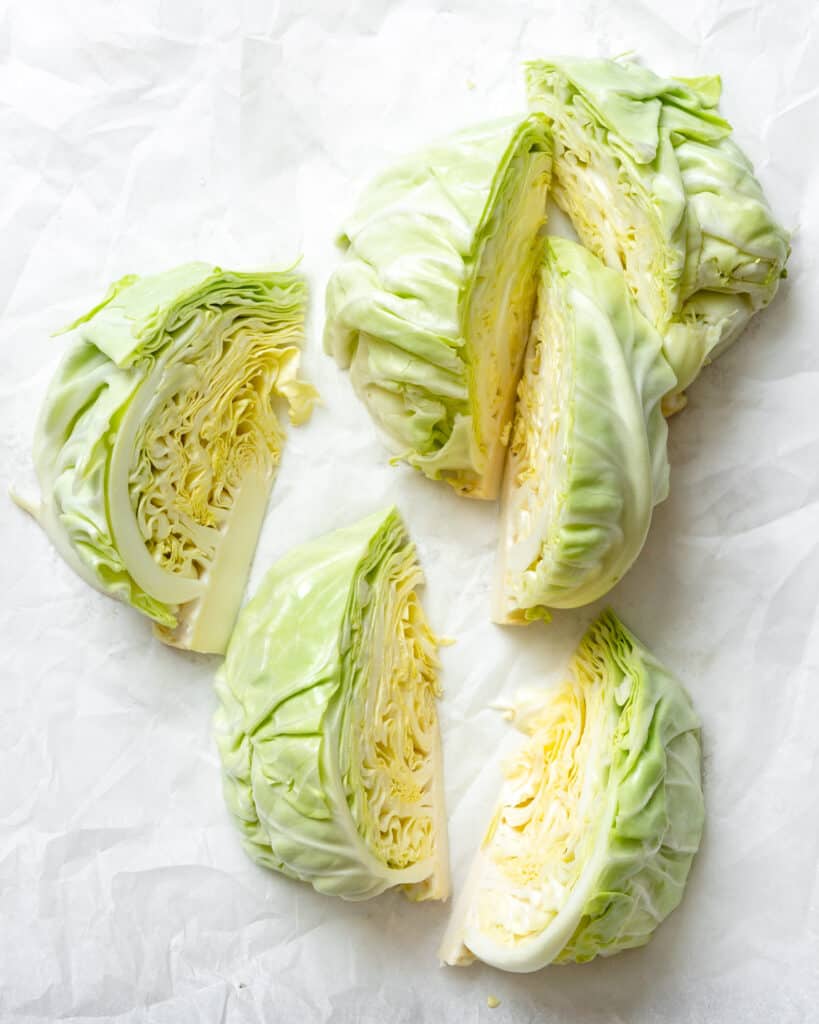 process shot showing sliced cabbage against a white surface