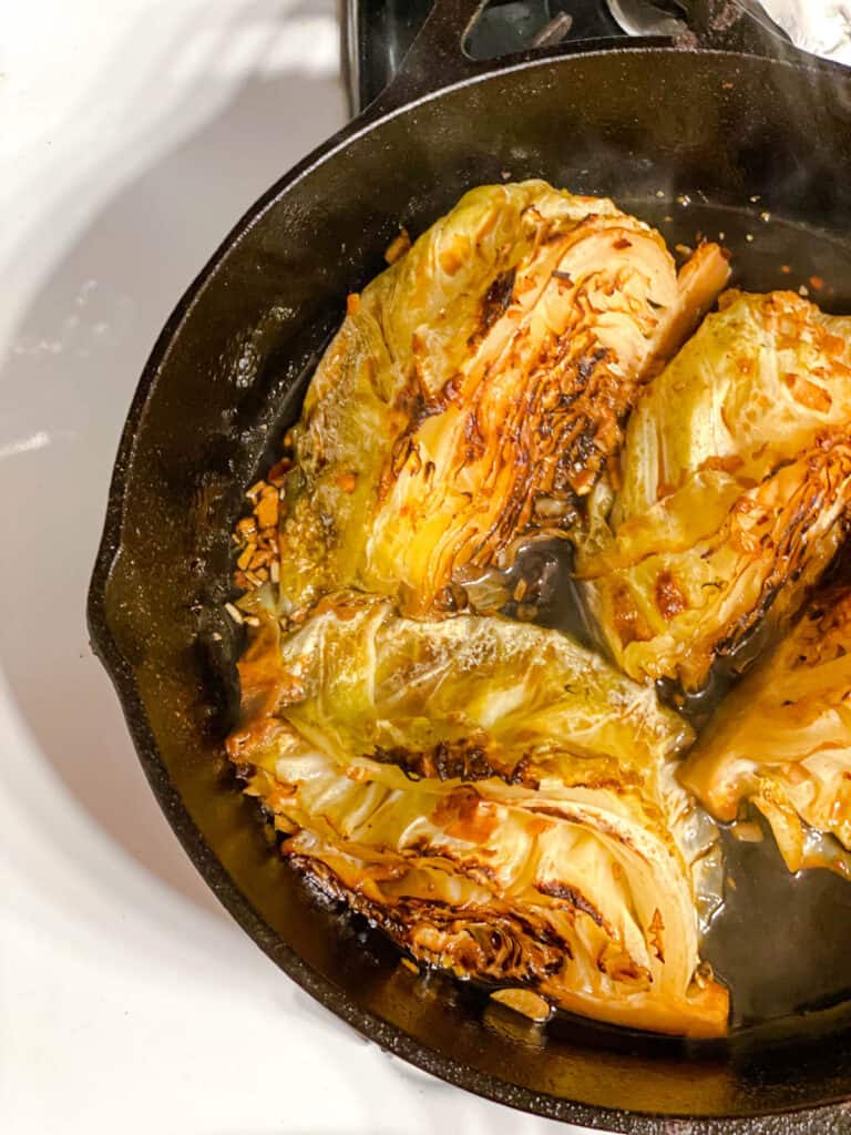 process shot of cabbage cooking in pan