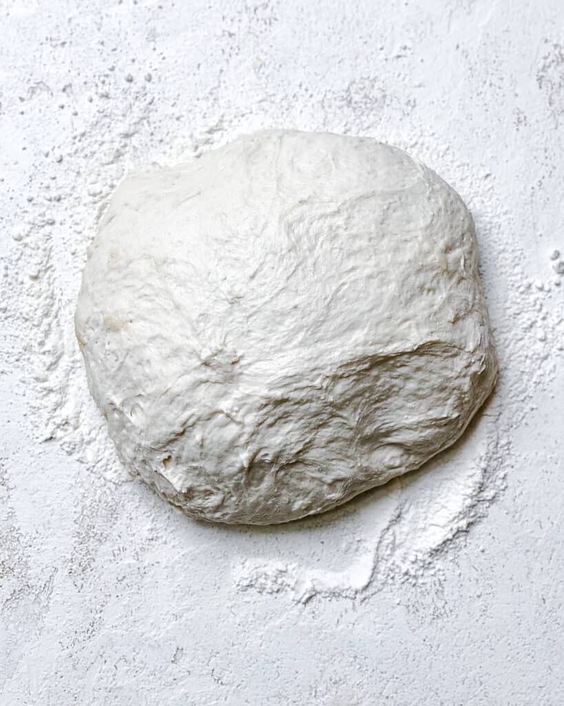 process shot of placing dough onto surface