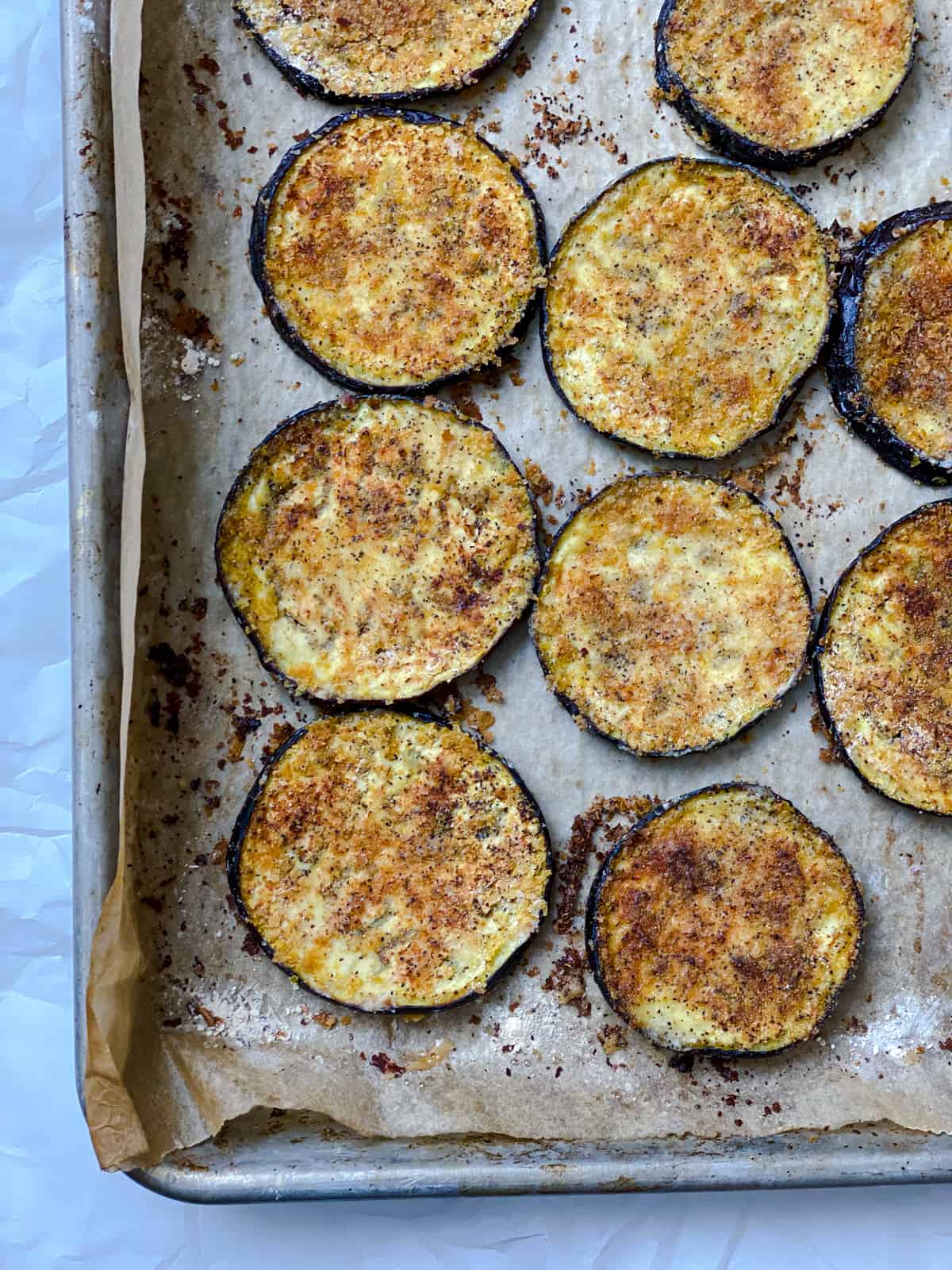 post baked eggplant slices in baking tray