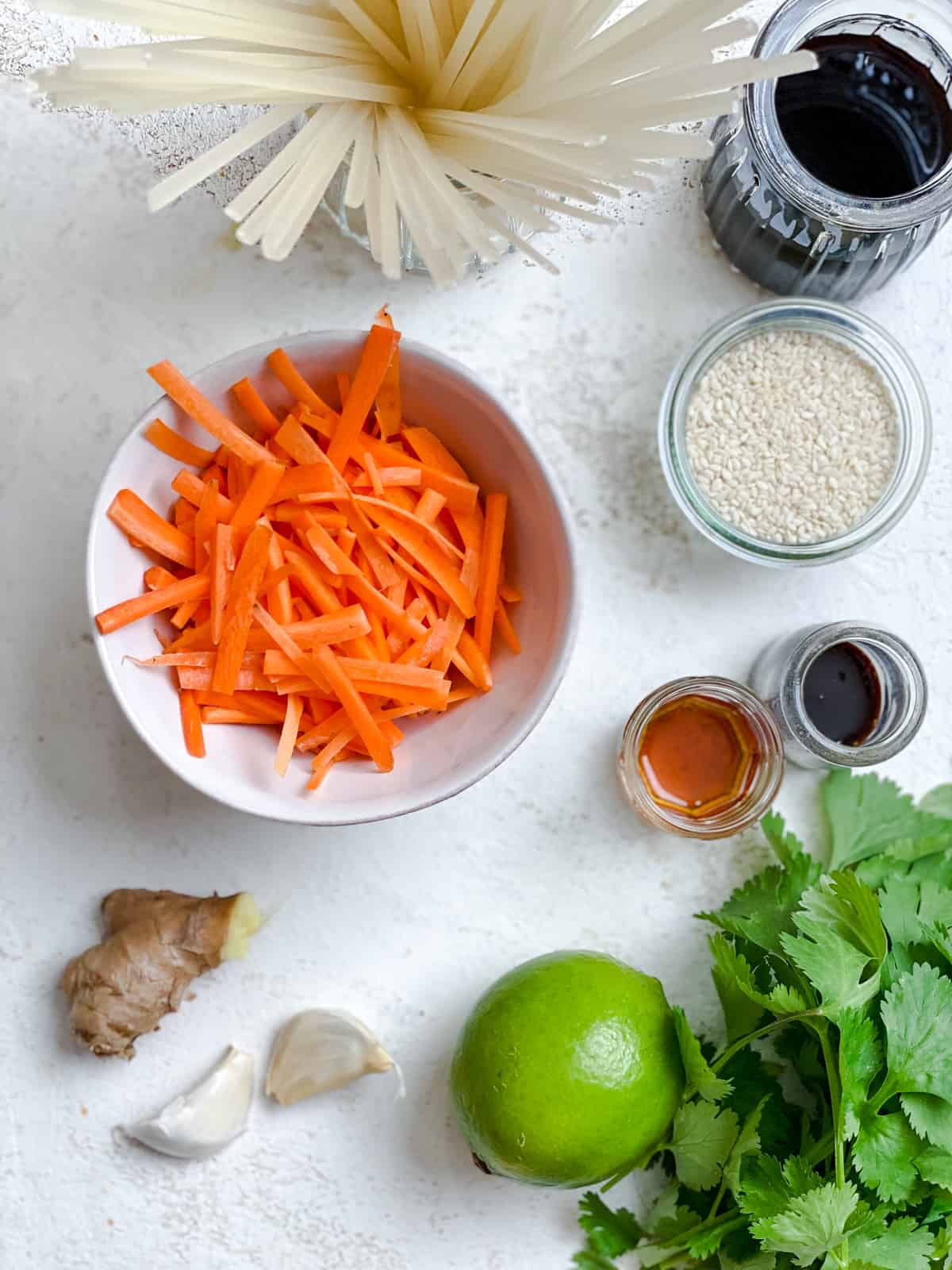 ingredients for Asian Noodle Salad [Cold Sesame Noodles] measured out against a white background