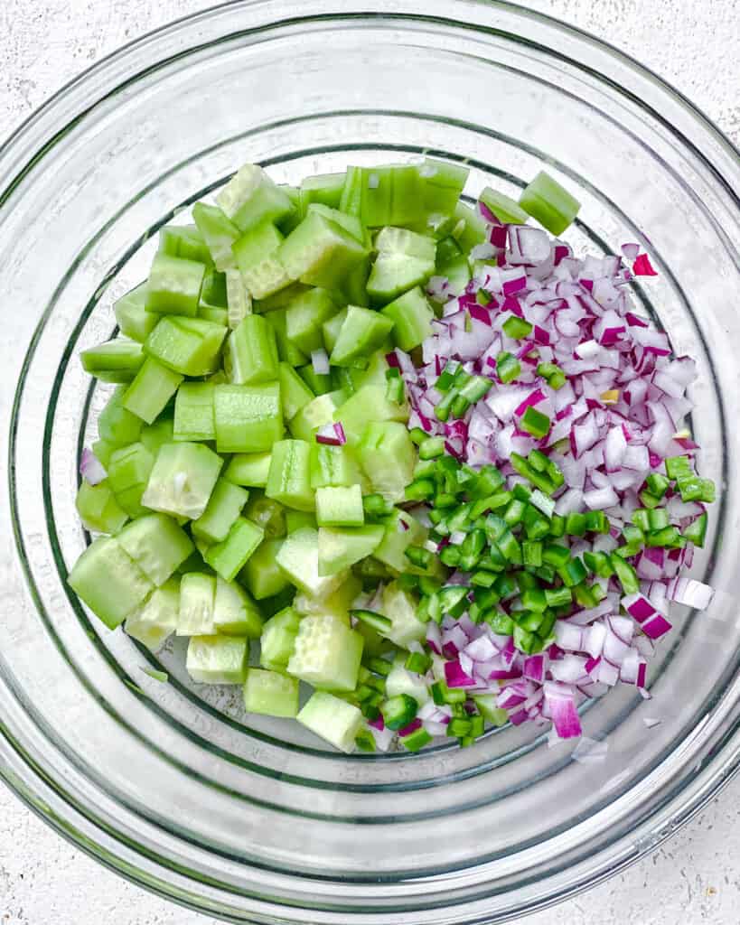 ingredients for Cucumber Salsa [Cucumber Pico de Gallo] added to bowl