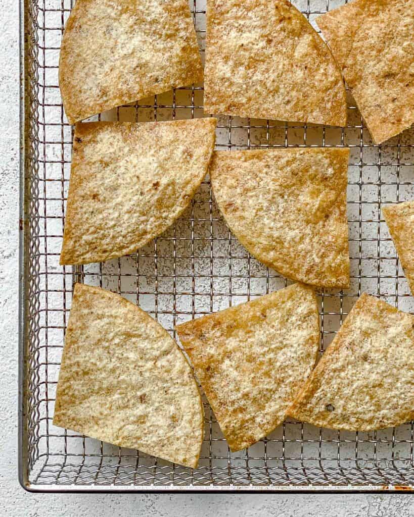 post air frying tortilla chips against tray