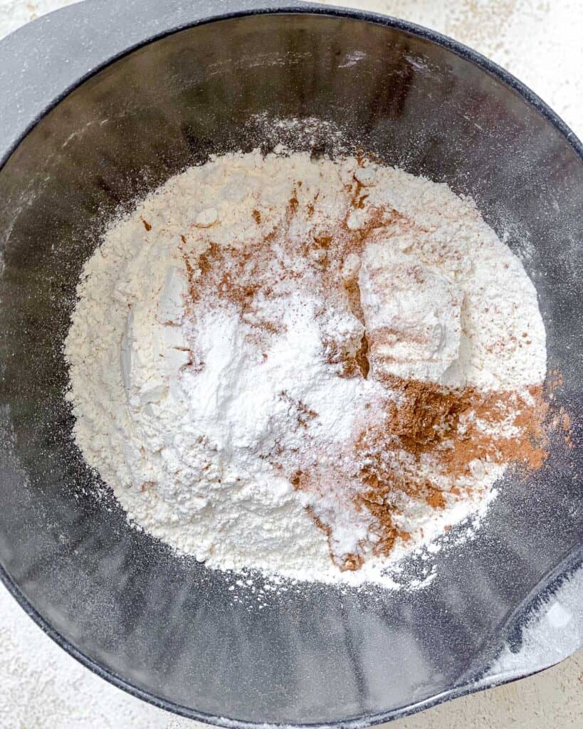 process shot post adding additional powders and spices to bowl of flour