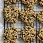 completed Vegan Oatmeal Chocolate Chip Cookies on a wire rack