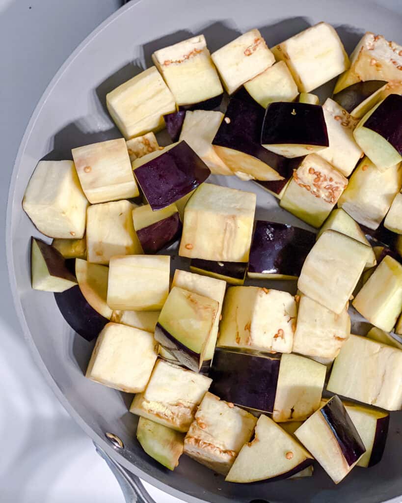 process s،t of cooking eggplant in pan