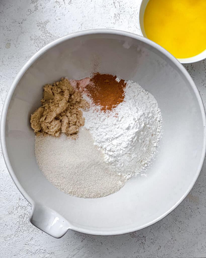 process shot of adding ingredients together in white bowl
