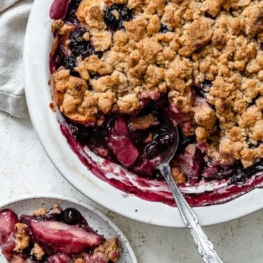 completed Apple and Blueberry Crumble against a light background