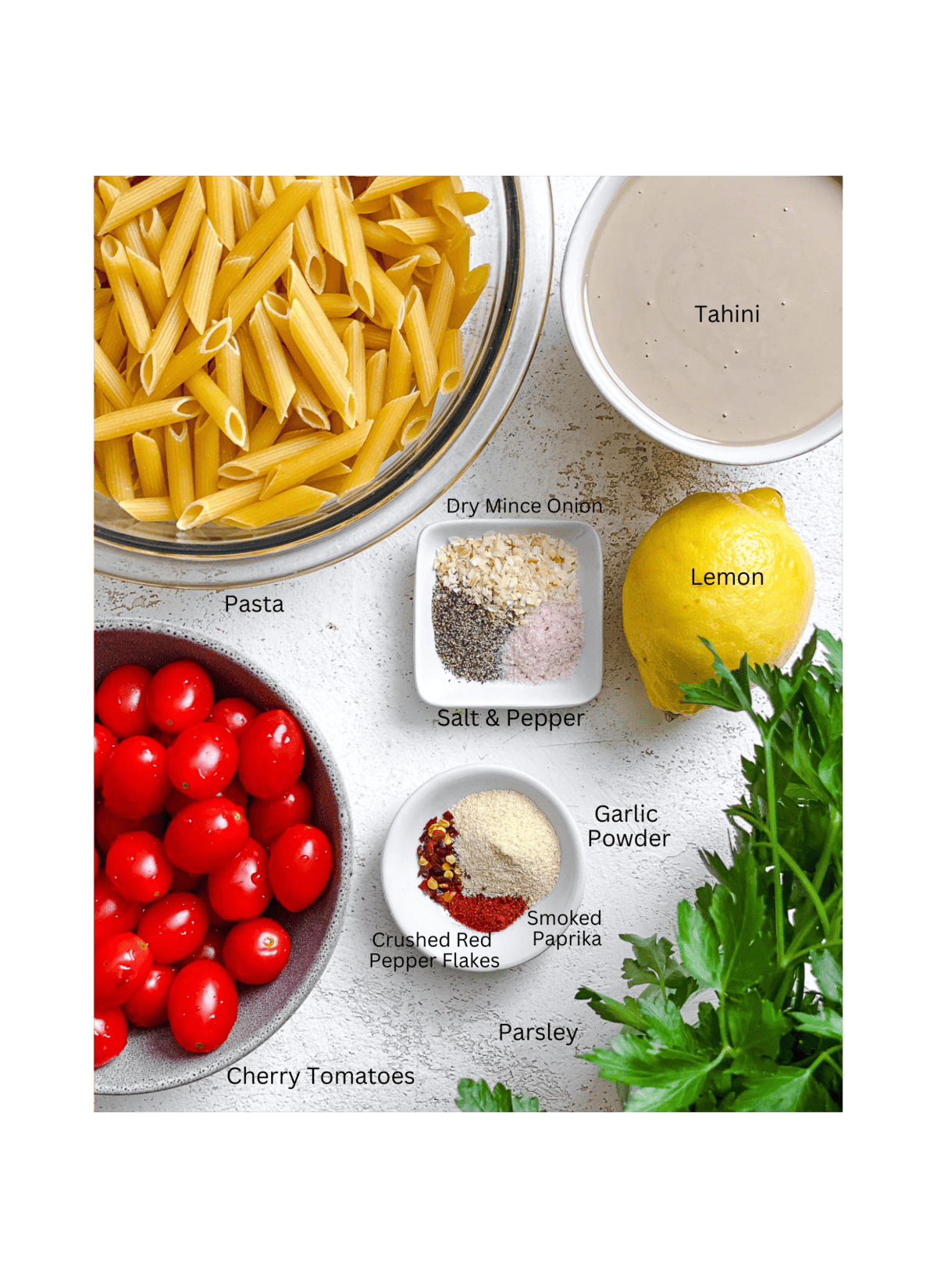 ingredients for 20-Minute Creamy Tahini Pasta measured out against a white surface