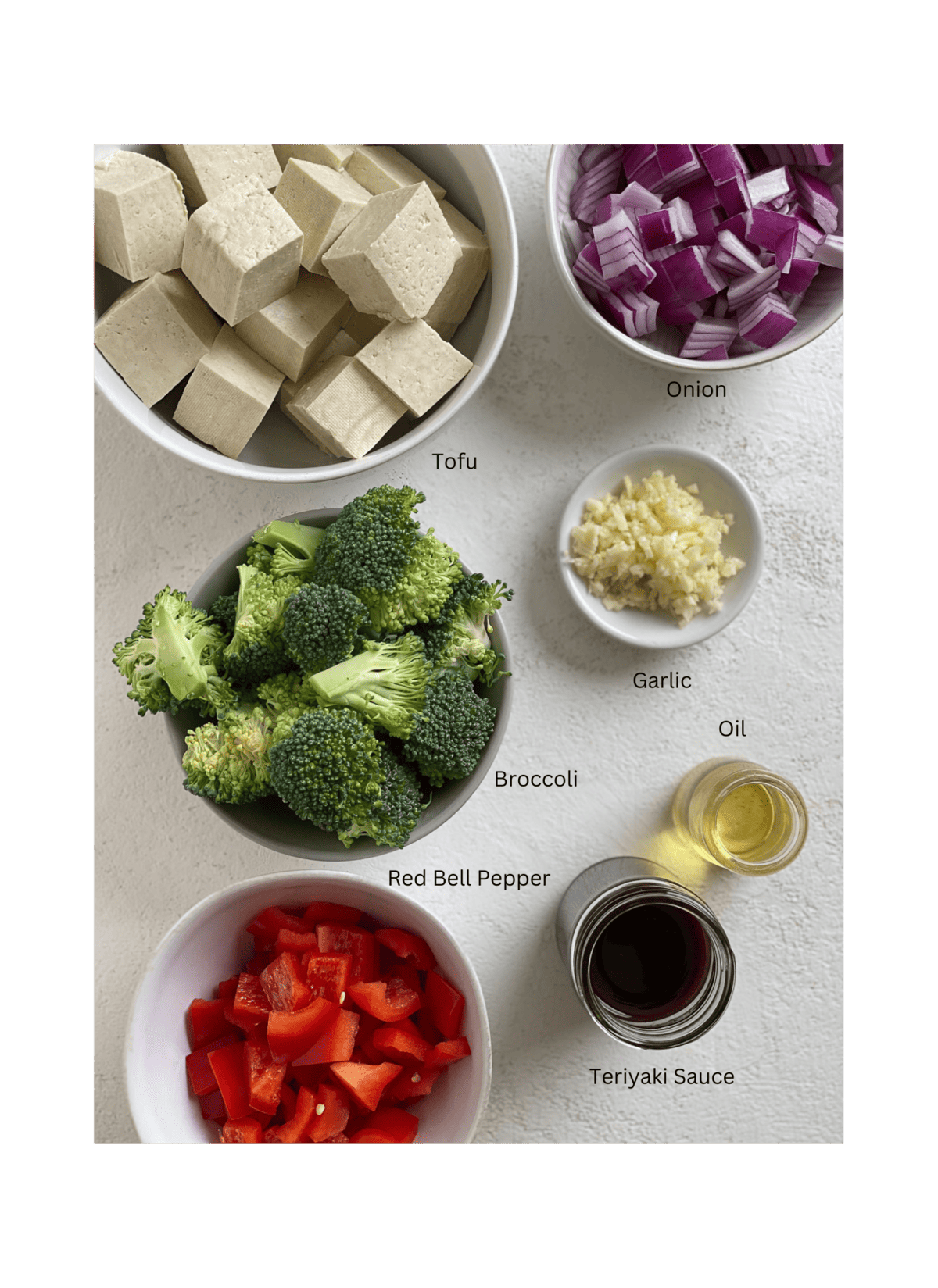 ingredients for Quick Teriyaki Tofu Stir Fry measured out against a white surface
