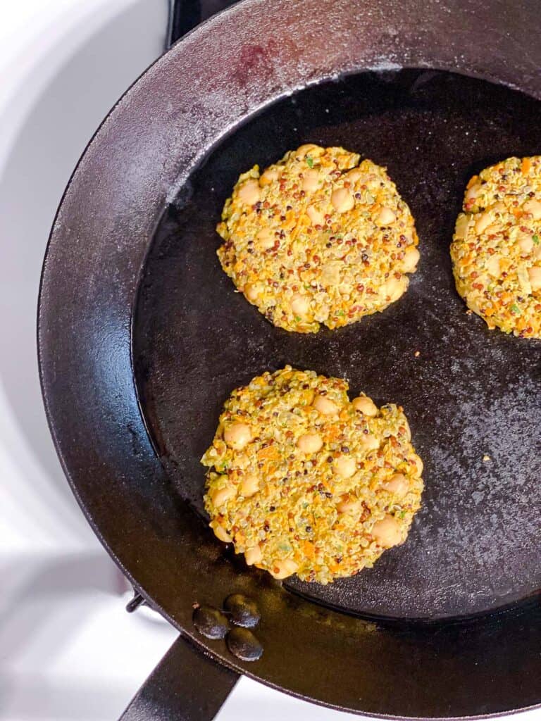 process shot of cooking patties on a skillet