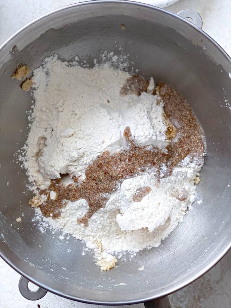 process shot showing flour added to mixing bowl