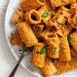 completed Red Pepper and Sun-Dried Tomato Pesto Pasta (Red Pesto Pasta) plated against a light background