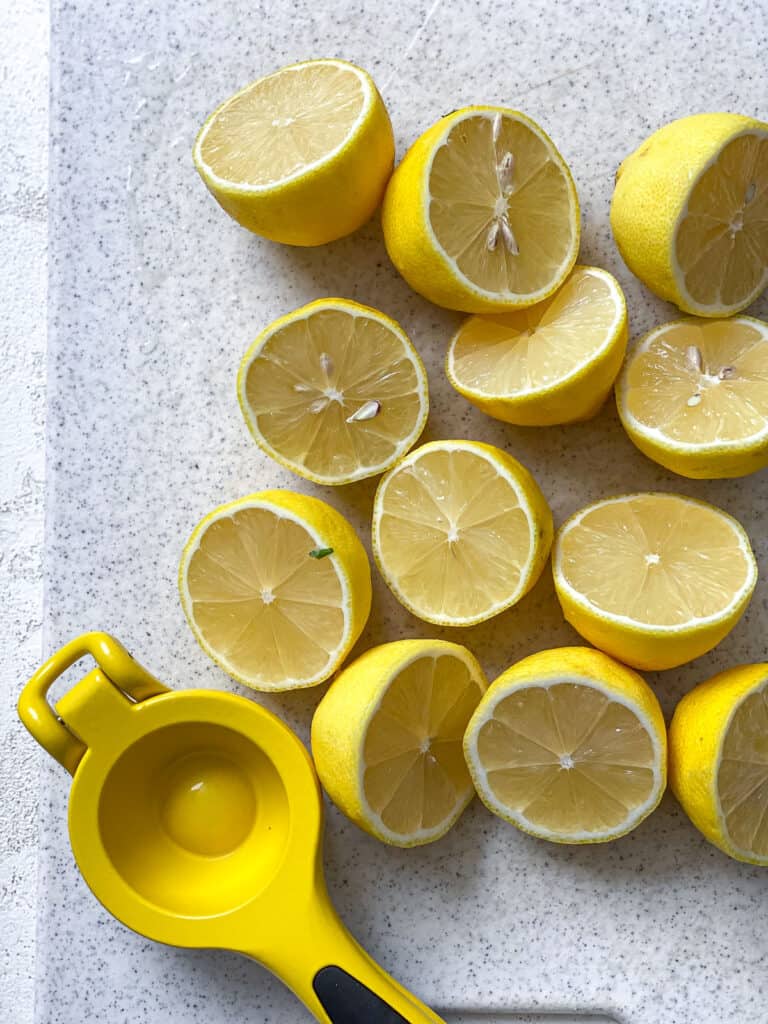 sliced lemons against a white surface
