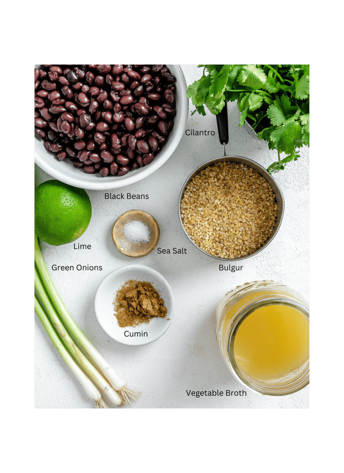 ingredients for Vegan Black Bean and Bulgur Burgers measured out against a white surface
