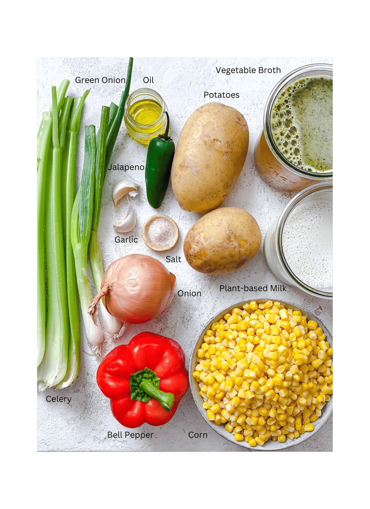 ingredients for Corn Chowder against a white surface