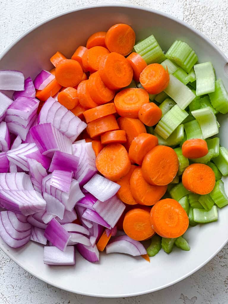 sliced veggies in a white bowl
