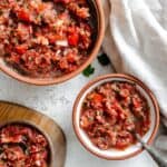 completed 5 Minute Garden Fresh Salsa in three different bowls against a white surface