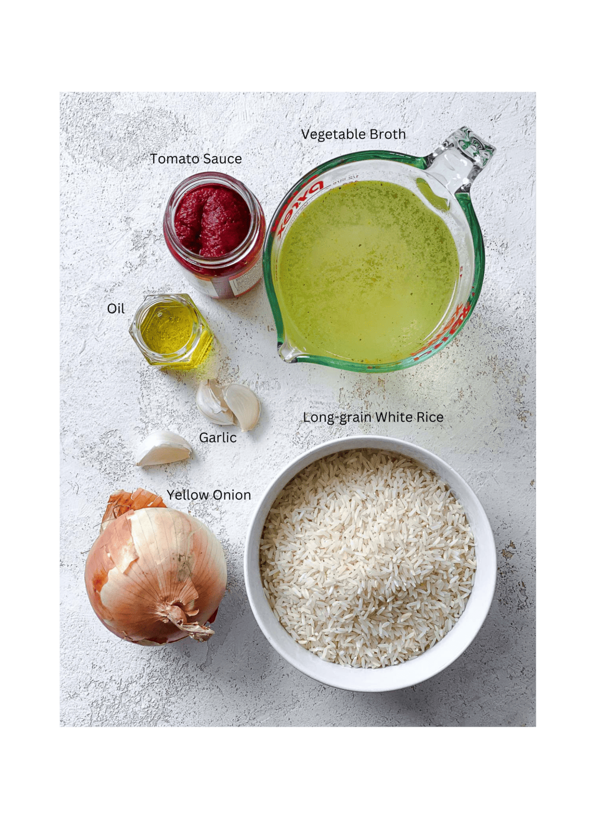 συστατικά για Easy Vegan Mexican Rice μετρημένα σε λευκή επιφάνεια
