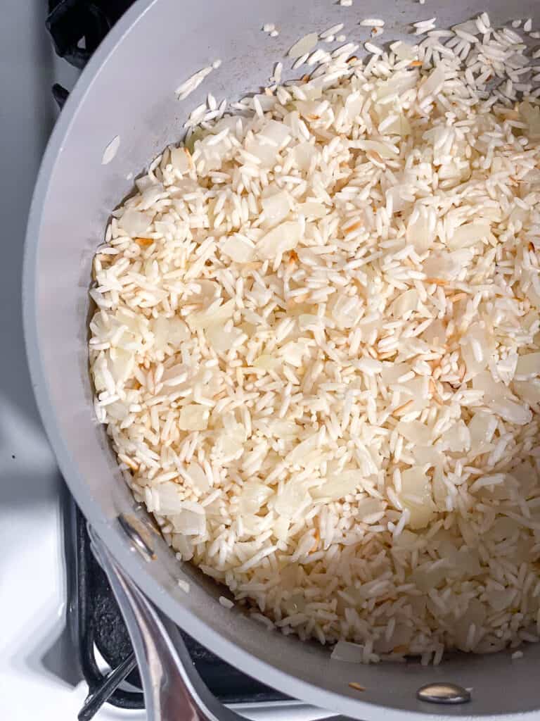 process shot showing rice cooking in pot